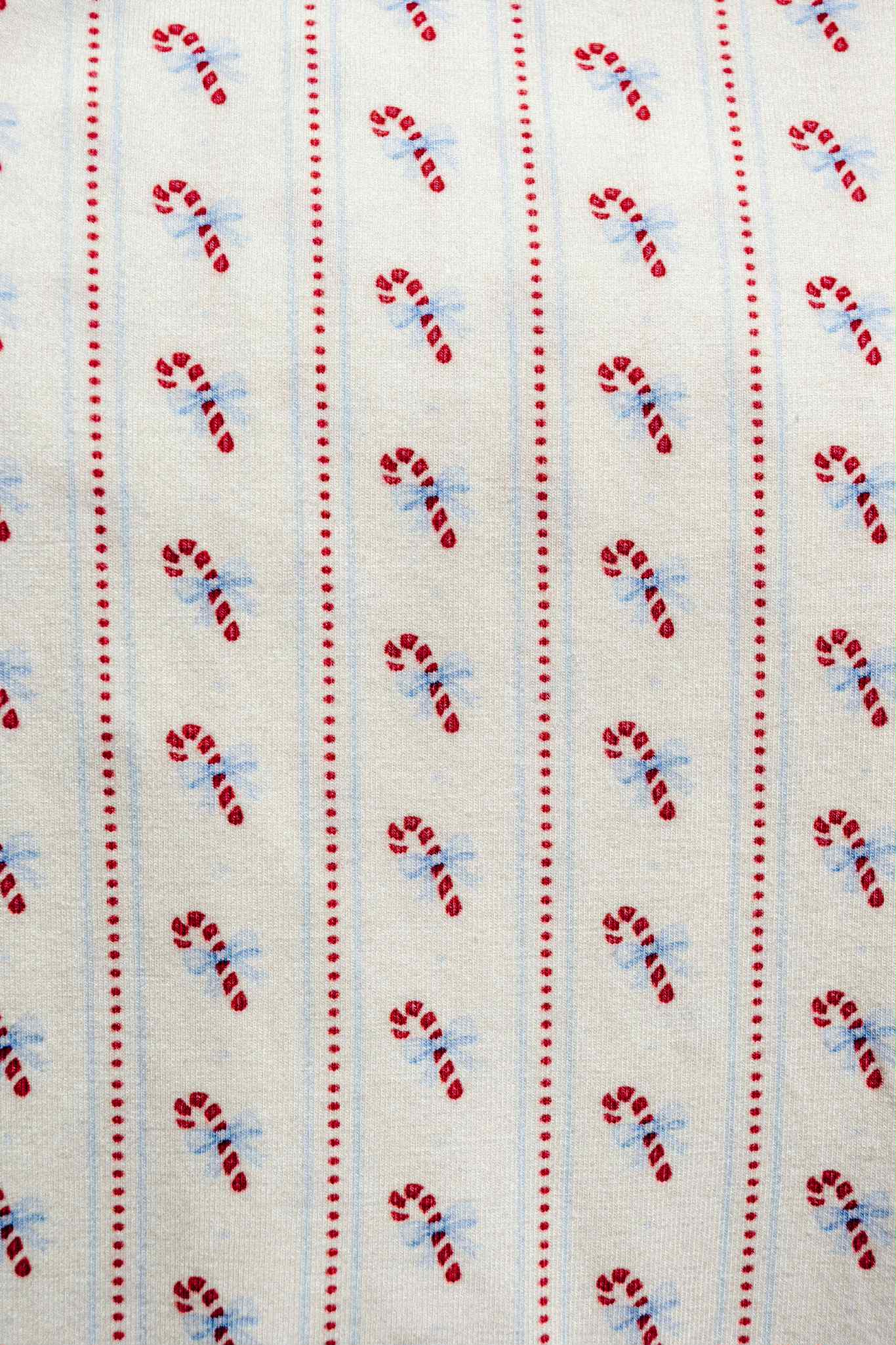 the wholesome store candy pyjama onesie