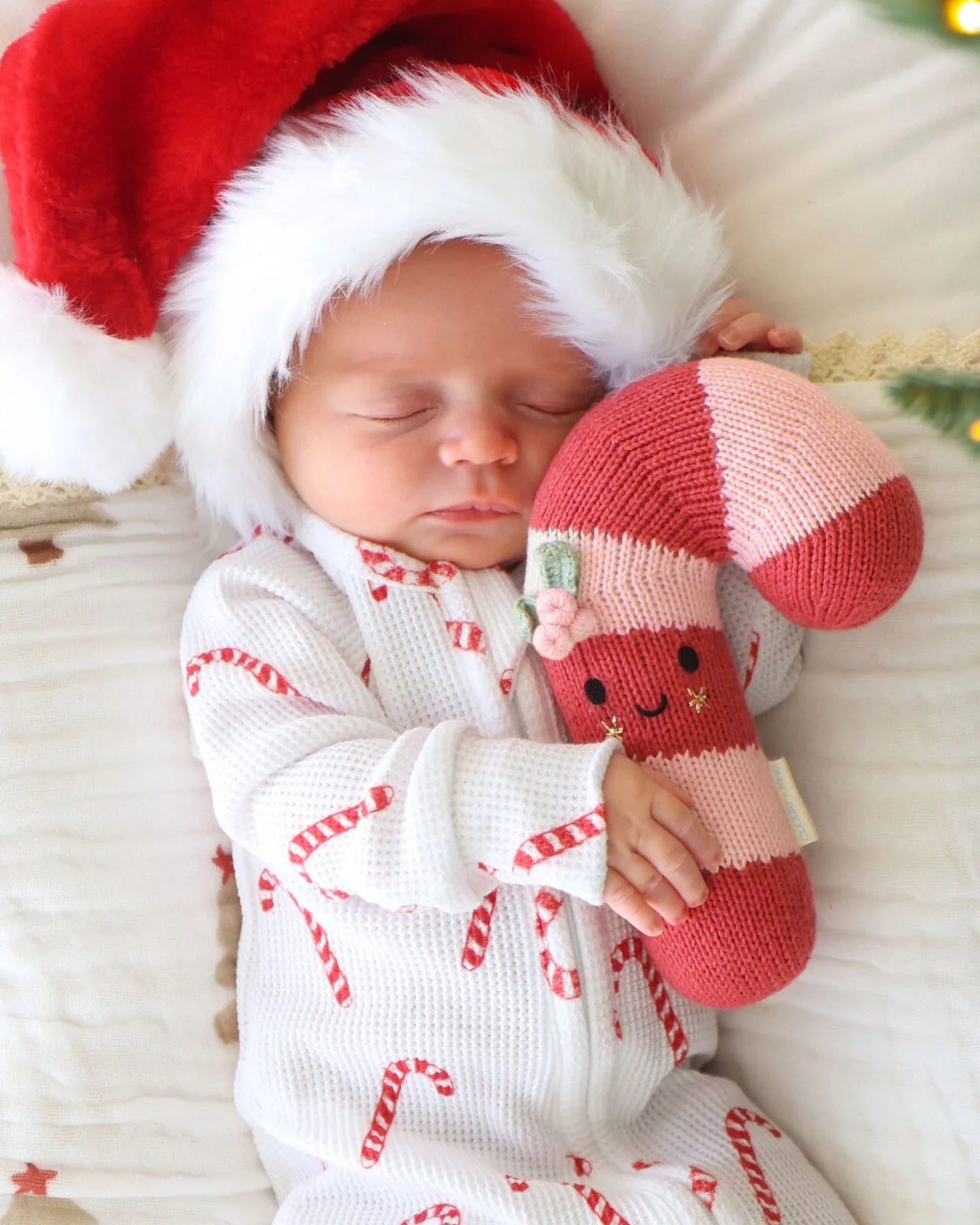 cuddle + kind baby candy cane - blush stripe