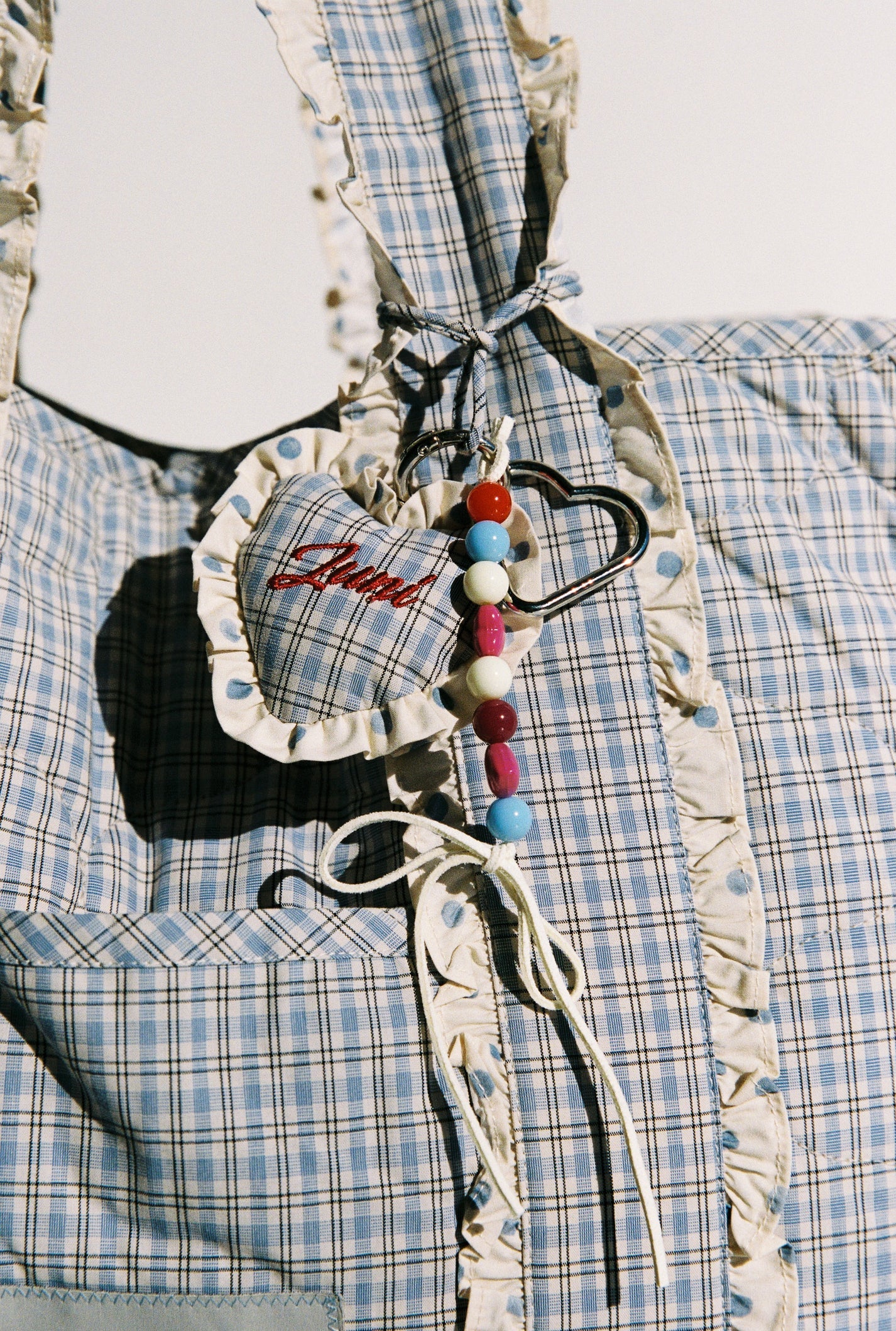juni heart bag charm - blue check