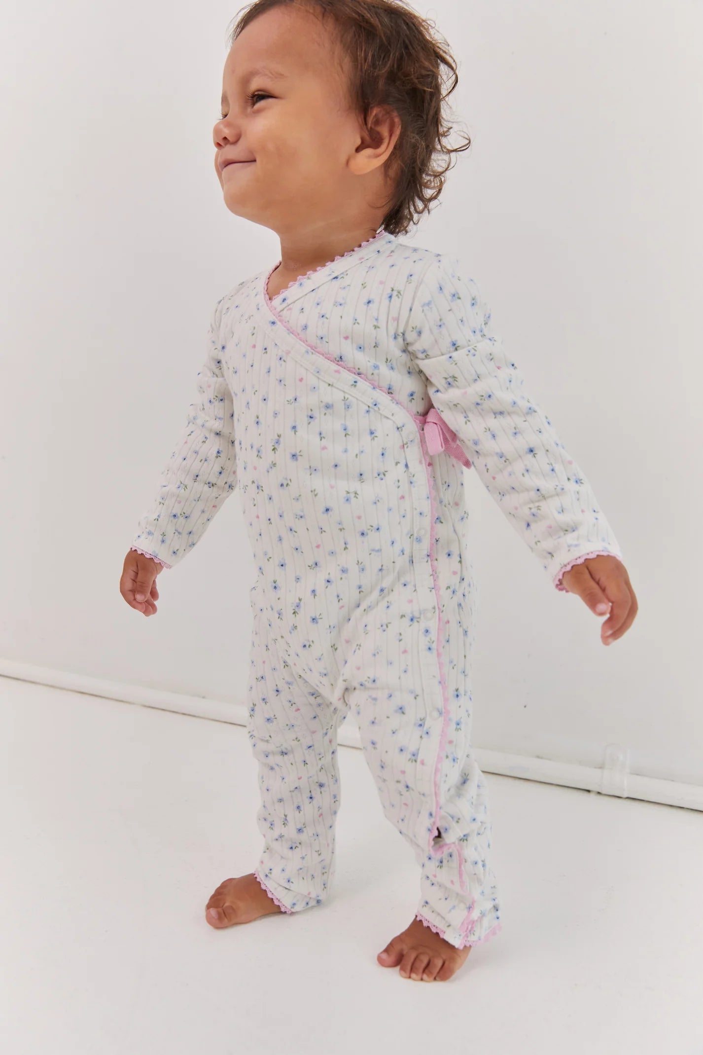 juni jnr meadow onesie - ditsy bloom