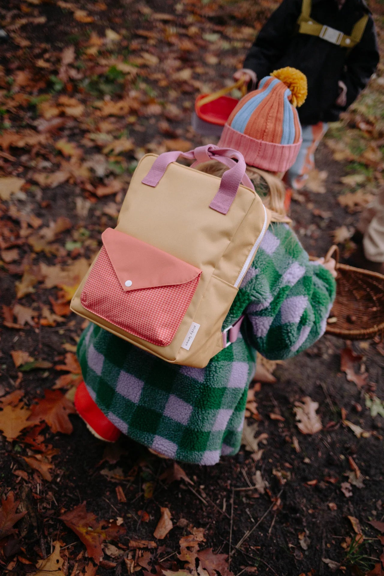 sticky lemon medium envelope backpack - apple grub