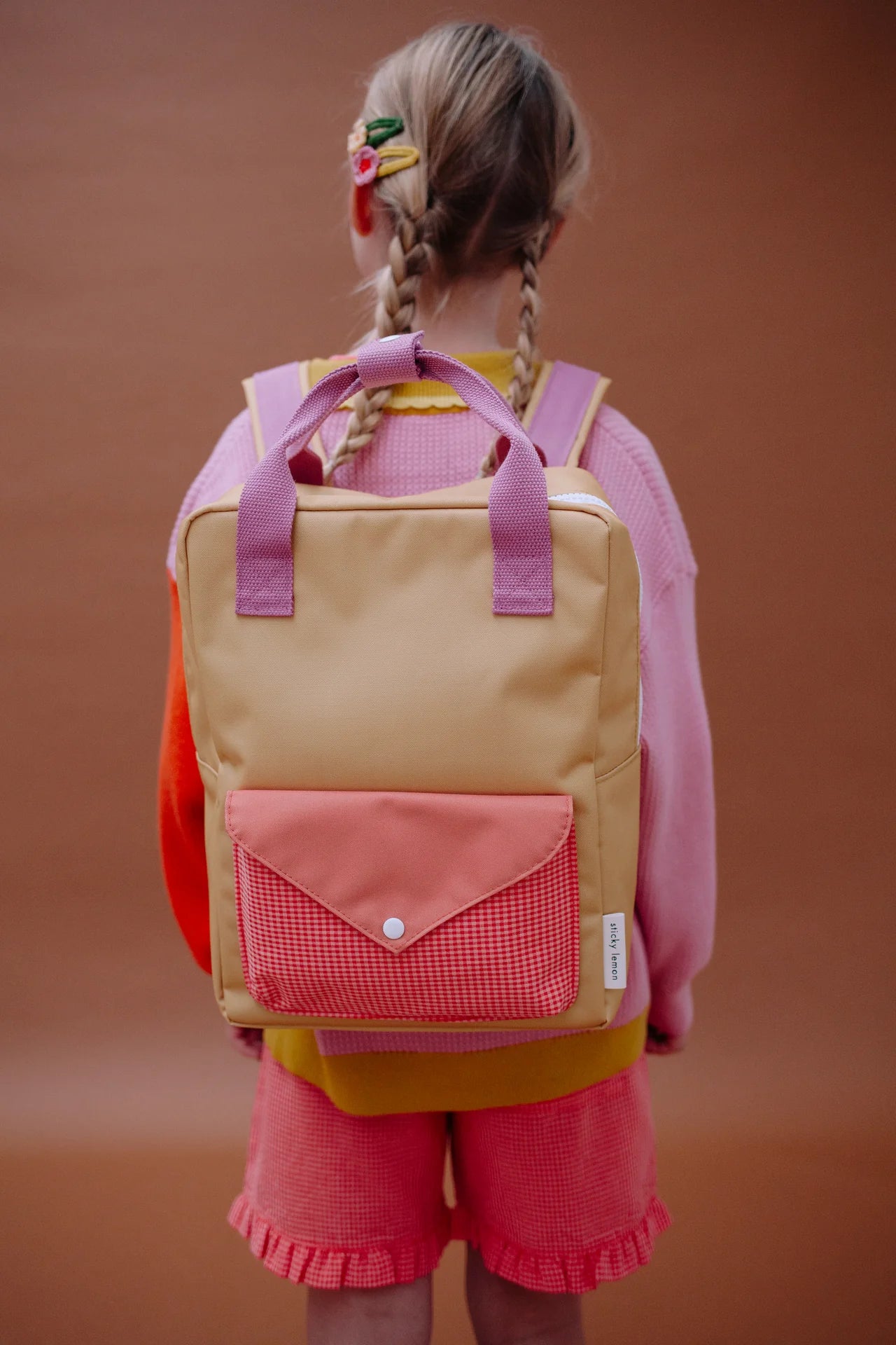 sticky lemon medium envelope backpack - apple grub