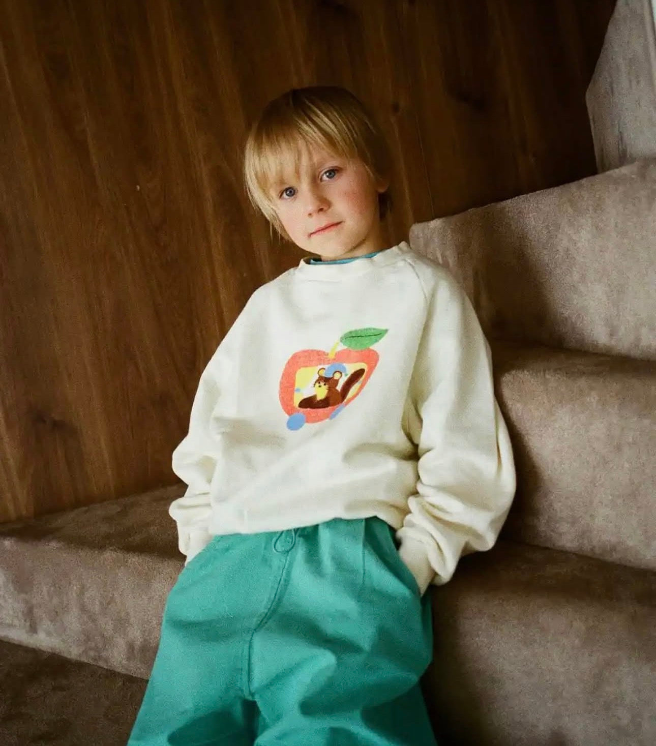 the campamento squirrel in an apple sweatshirt