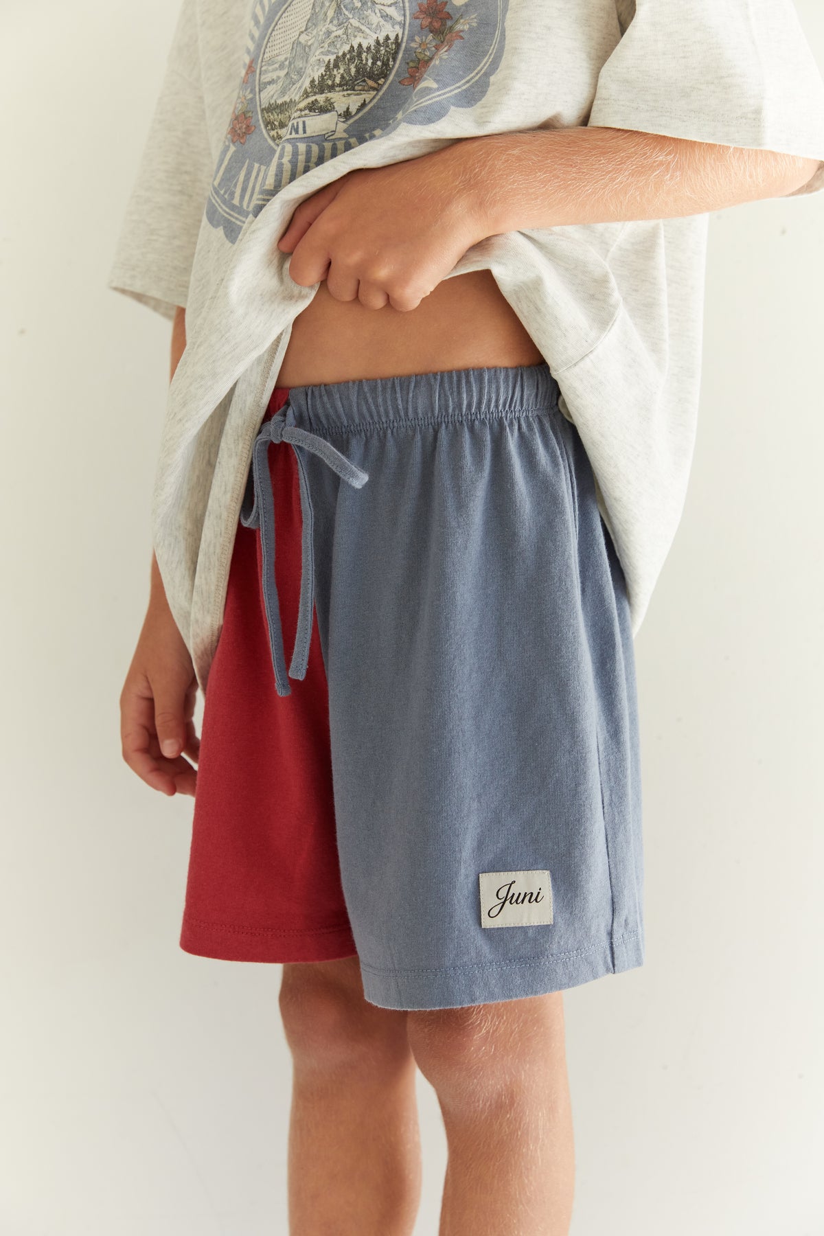 juni jnr rayne short - paprika / blue
