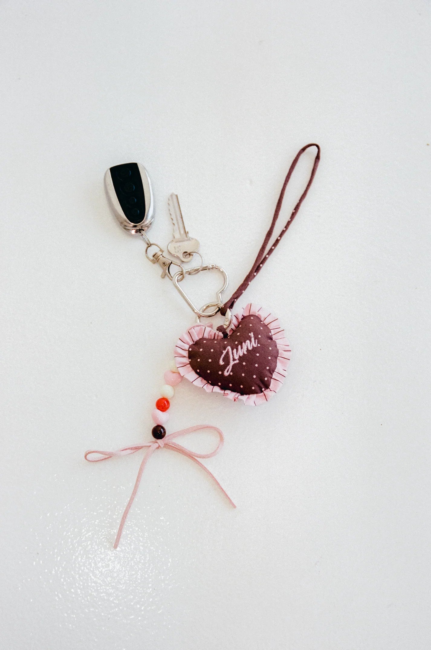 juni heart bag charm  - cocoa stripe - pre order