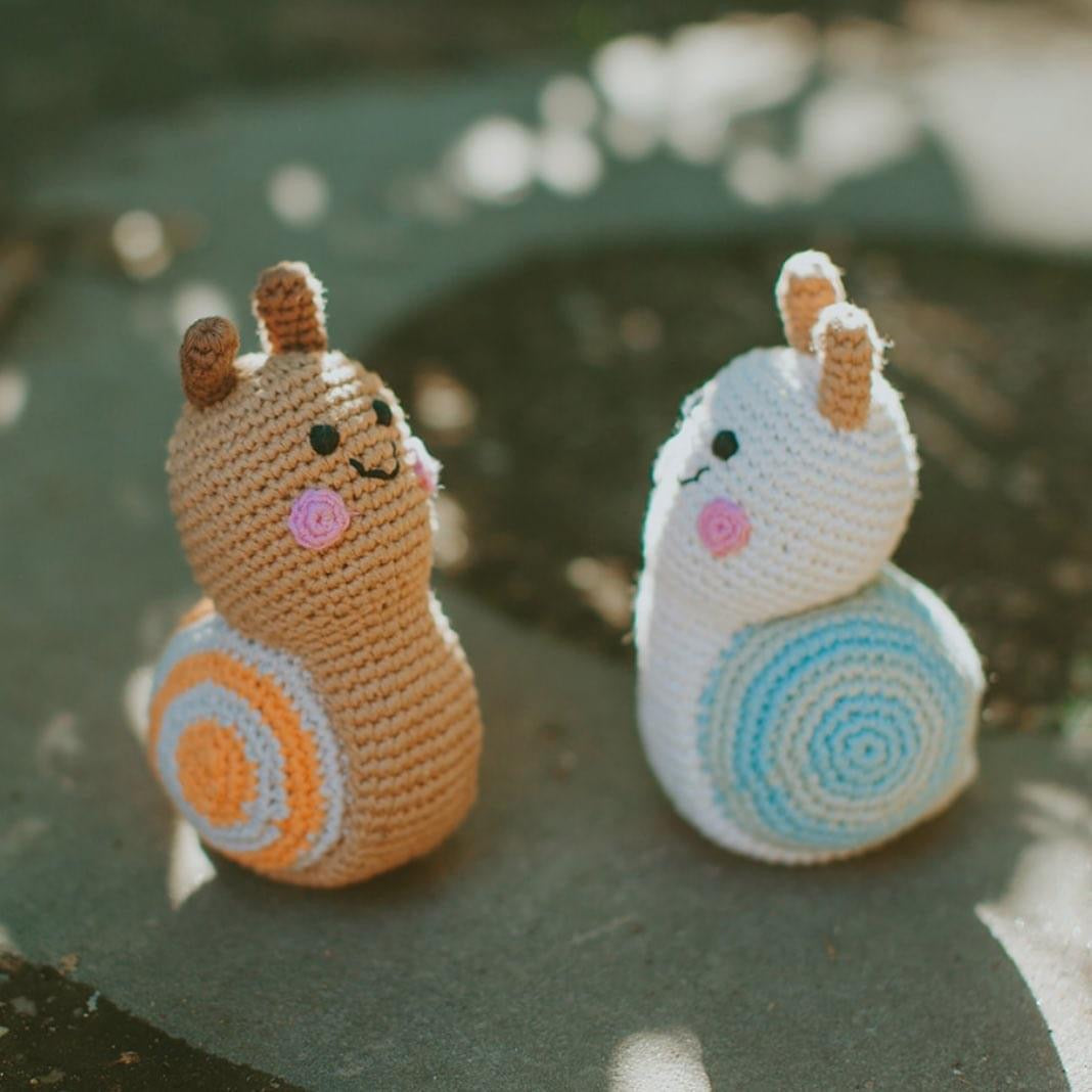 pebble child snail rattle - brown sugar