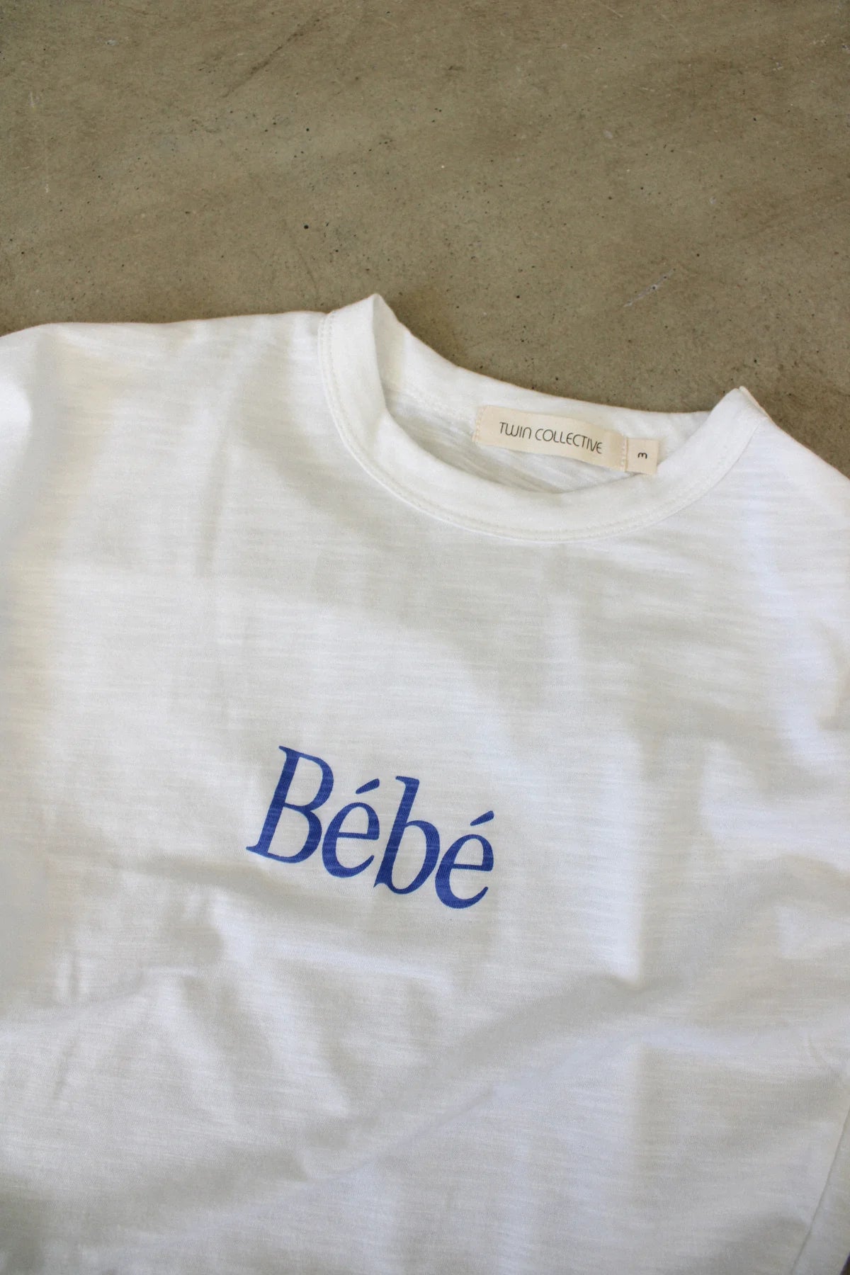 twin collective bebe tee