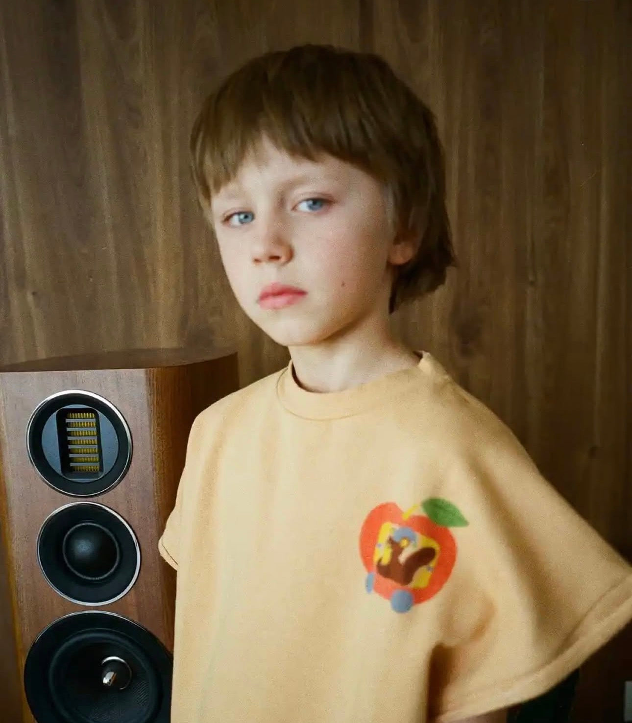 the campamento squirrel in an apple oversized vest
