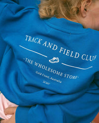 the wholesome store mini track and field sweater