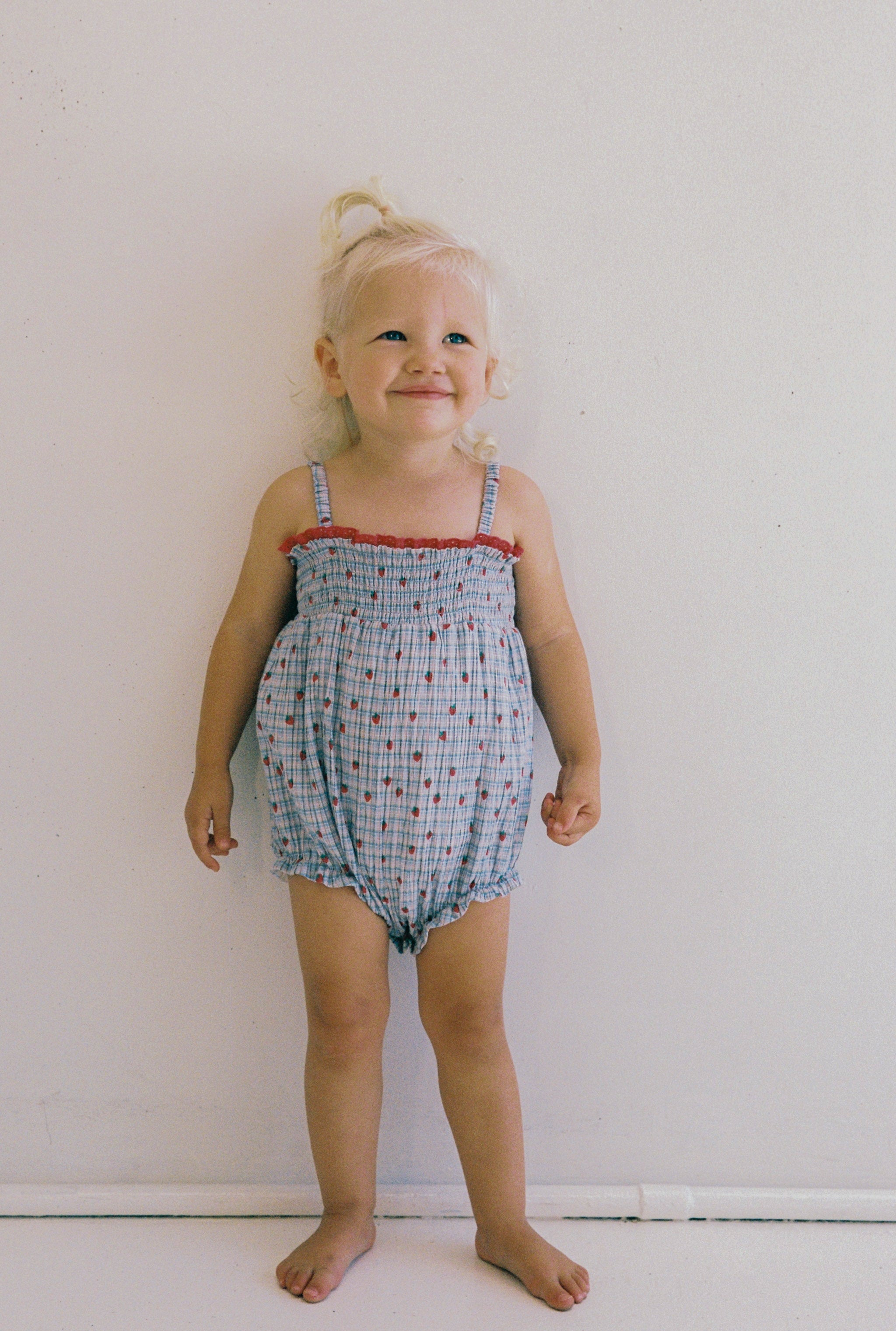 juni jnr lottie romper - strawberry check