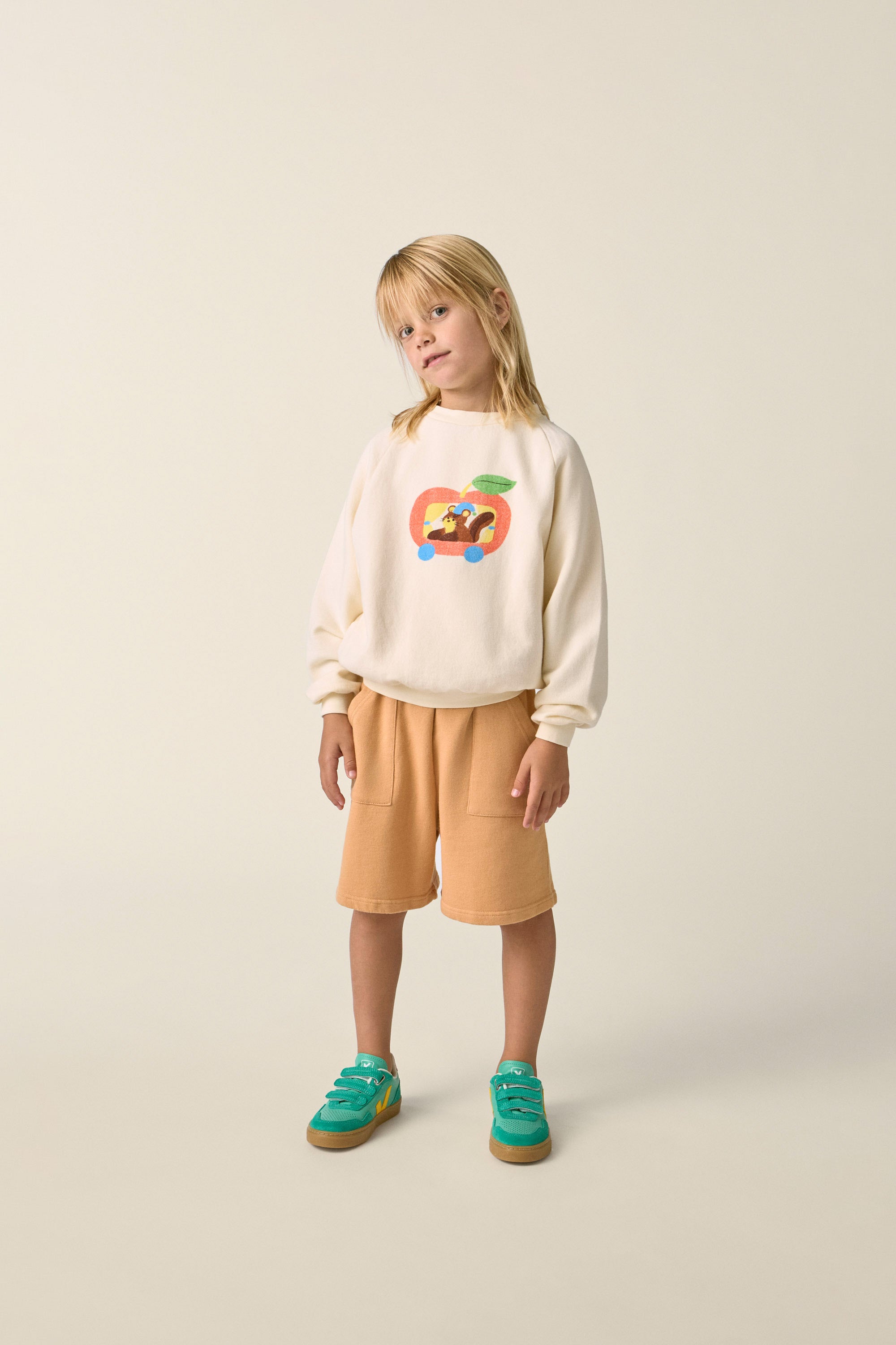 the campamento squirrel in an apple sweatshirt