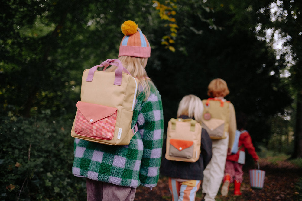 sticky lemon medium envelope backpack - apple grub